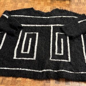 One A Black and White Knit Sweater